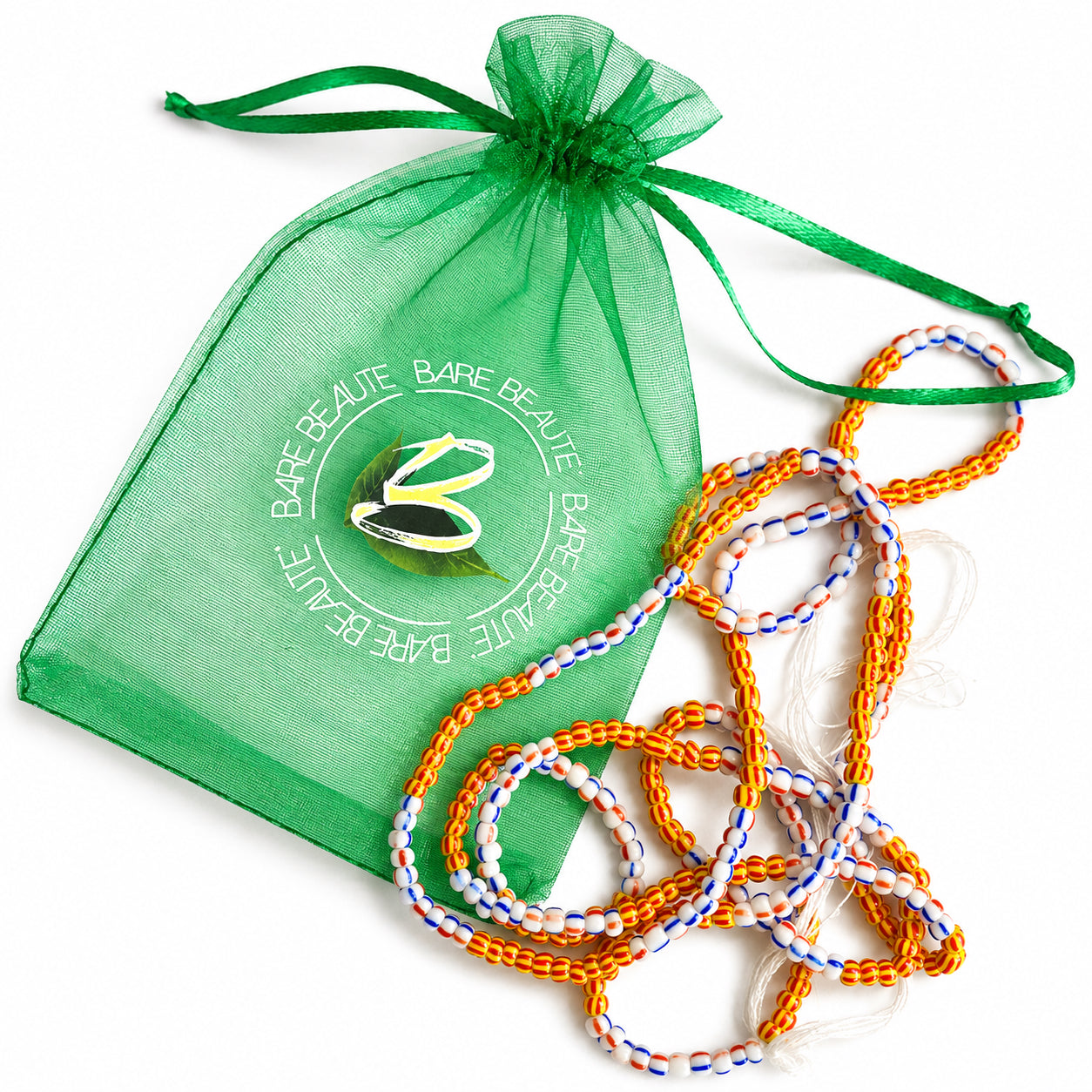 A green sheer organza drawstring pouch with a white Bare Beautie logo, shown next to a coiled bundle of orange, white, and blue braided cord bracelets on a white background.